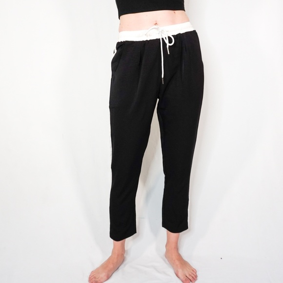 black jogger with white stripe